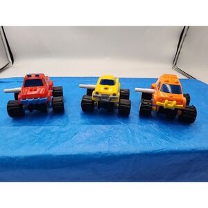 Vintage McDonalds Happy Meal Monster Truck Toy Lot Red Yellow Orange Set of 3
